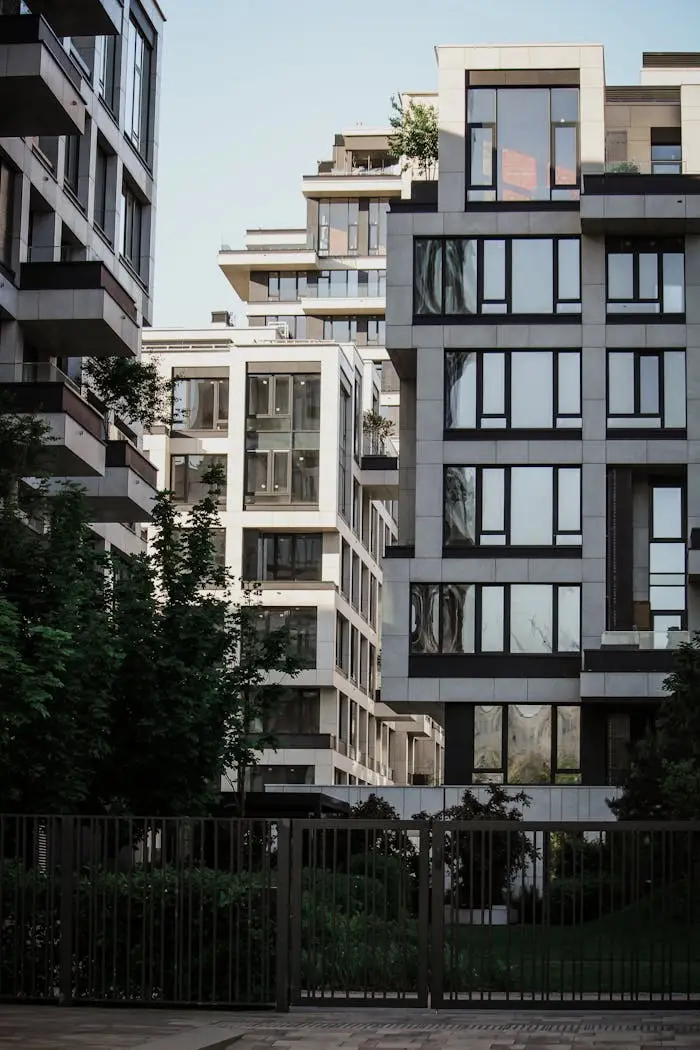 Services A view of contemporary buildings with minimalist design in an urban setting.